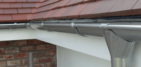 Colorbond Guttering. A steel gutter and downpipe often costs less than the price of aluminium gutters